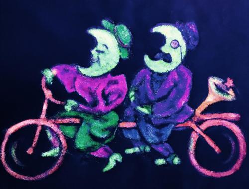 Two Victorian Moons Riding a Dream Bike